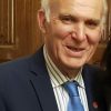 Sir Vince Cable wearing the ACTIVE lapel badge